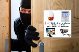 Burglary crime - burglar opening a door